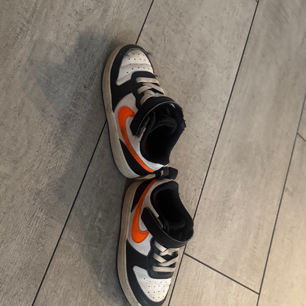 Nike Kids Black, White, and Orange Sneakers